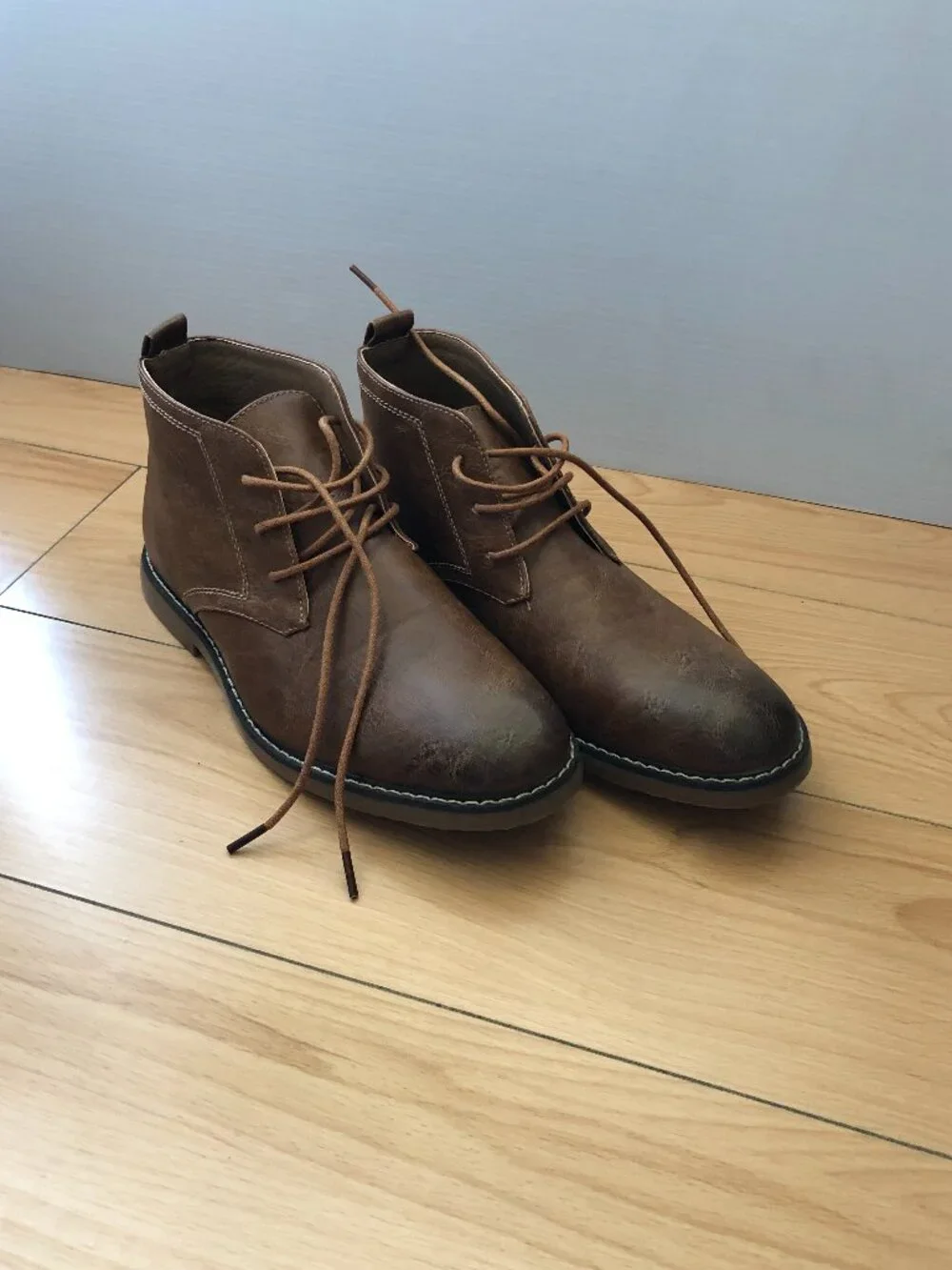 metro charm. Brown lace up booties